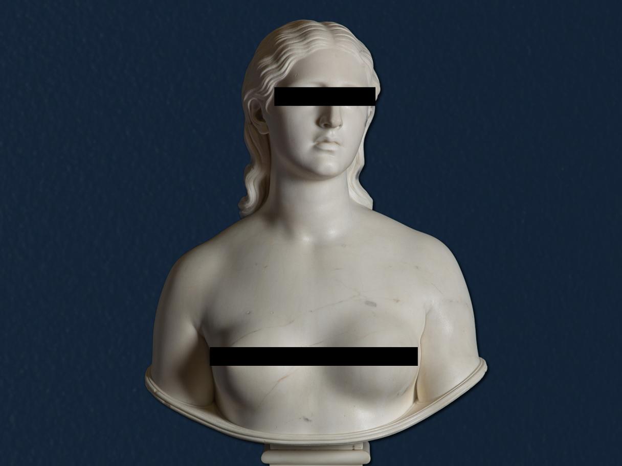 A porcelain bust of a nude woman with digital black bars covering her eyes and chest.
