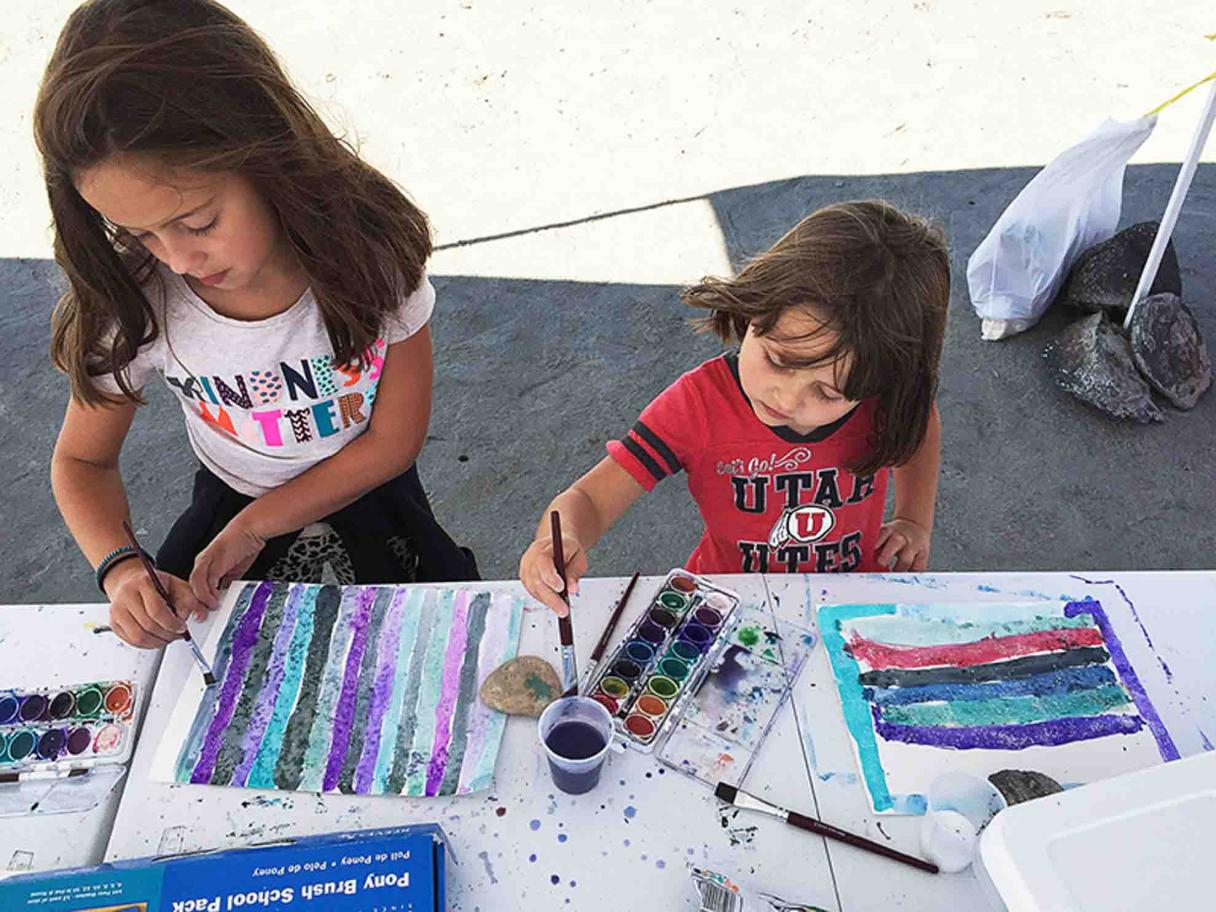 Kids water color painting at the UMFA Spiral Jetty meet up.