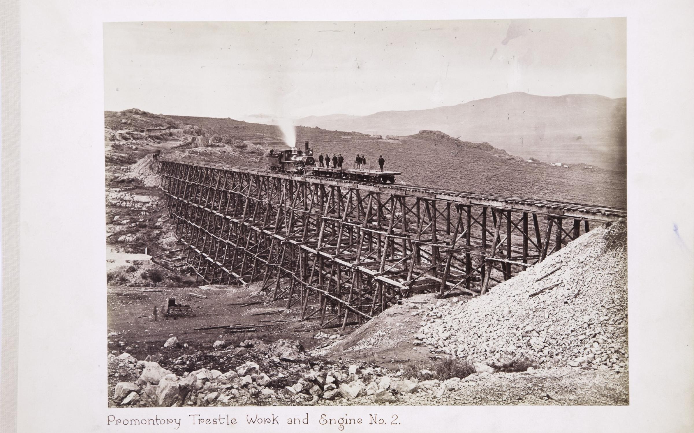 Andrew J. Russell, (American, 1829–1902), Promontory Trestle Work and Engine No. 2, 1869, albumen silver print, courtesy Union Pacific Railroad Museum 