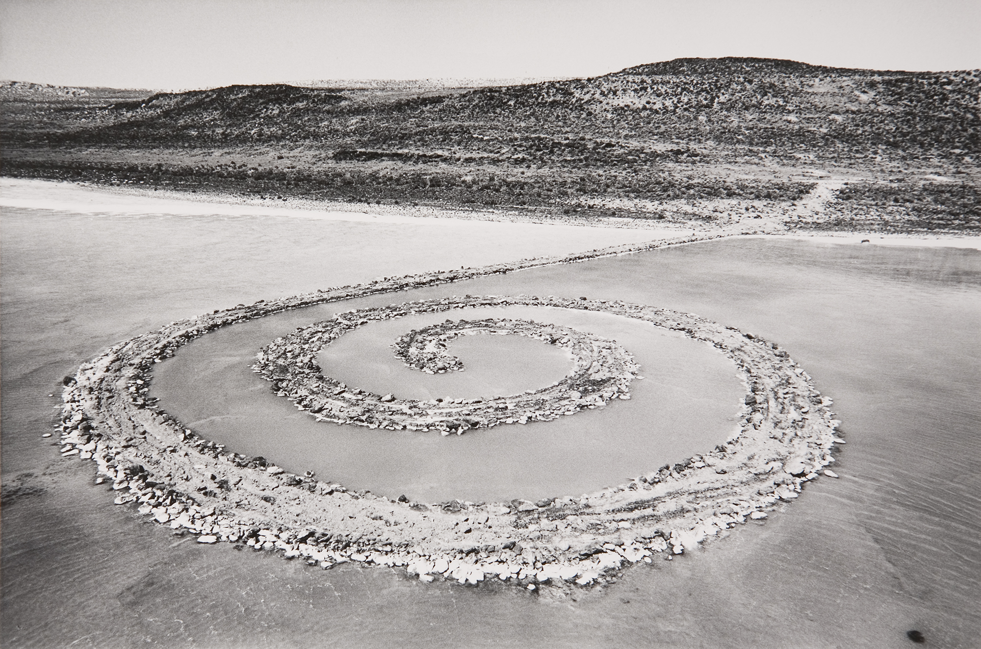 Gianfranco Gorgoni (1941 – 2019), Spiral Jetty, 1970, gelatin silver print, 13 ½ x 16 ½ in., Gift of the John Weber Gallery, UMFA1996.22.1. 