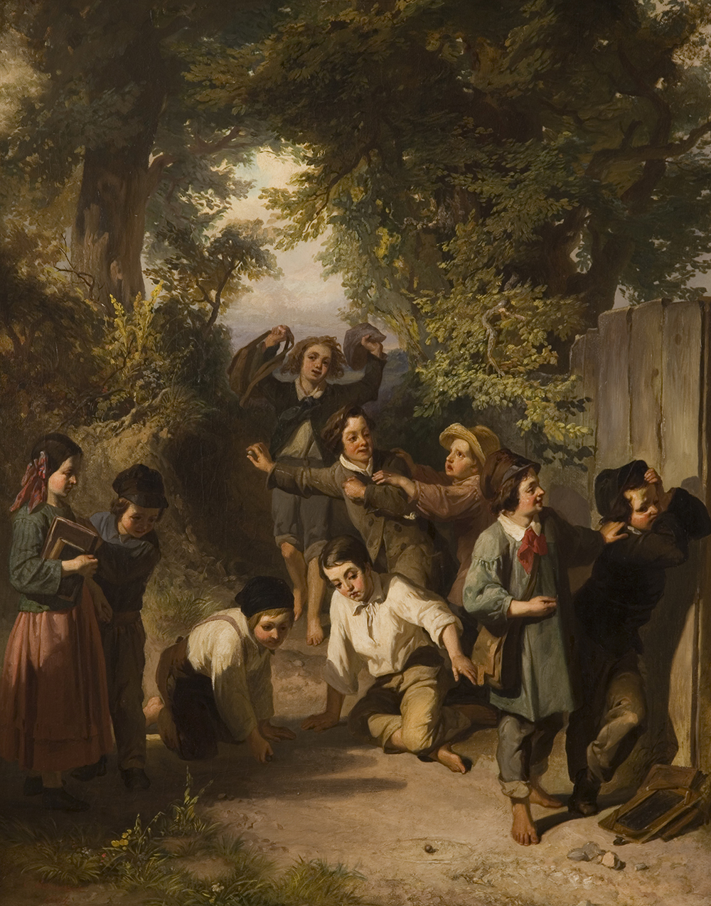 A group of schoolchildren are on a wooded path with a wood fence on one side. Several boys are playing marbles in the center of the path. Two boys are fighting behind the players. A girl and boy are observing the game while two boys are facing away leaning on the fence.