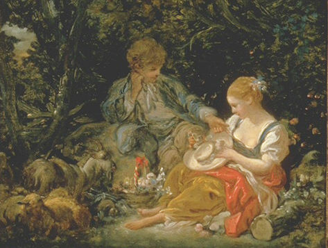 a young couple sit in a forest