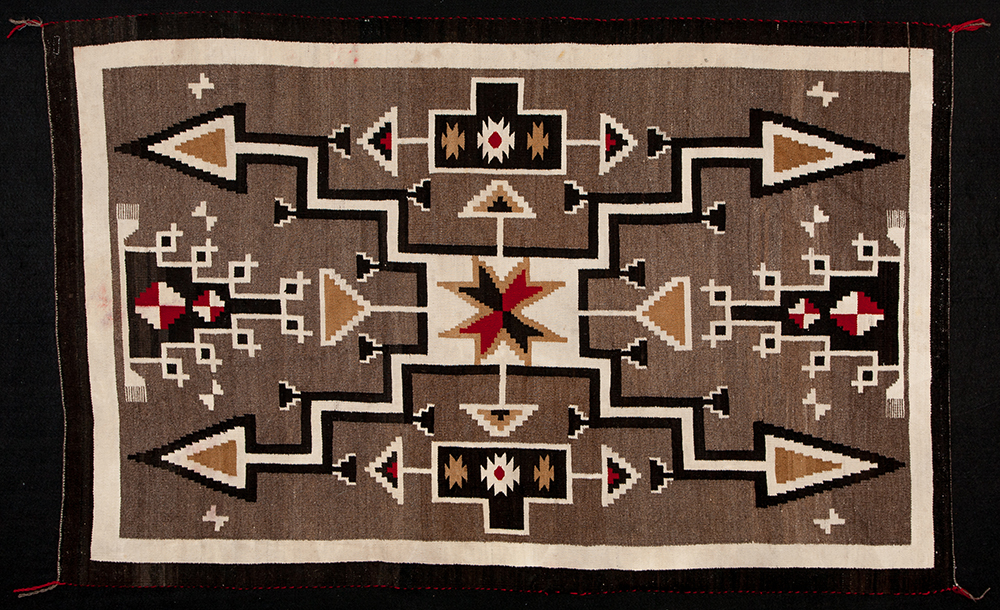 The Diné artist that created this woven rug drew on a long tradition of shapes and patterns to create a picture of a storm. What parts of a storm can you see? Where are the clouds? Is there lightning? What about rain? Your drawing or painting of a cloudscape can have different patterns that show the form of the clouds, too. 