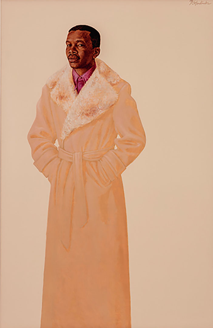 A portrait of a Black man in a full-length tan goat with extra wide fur lapels.