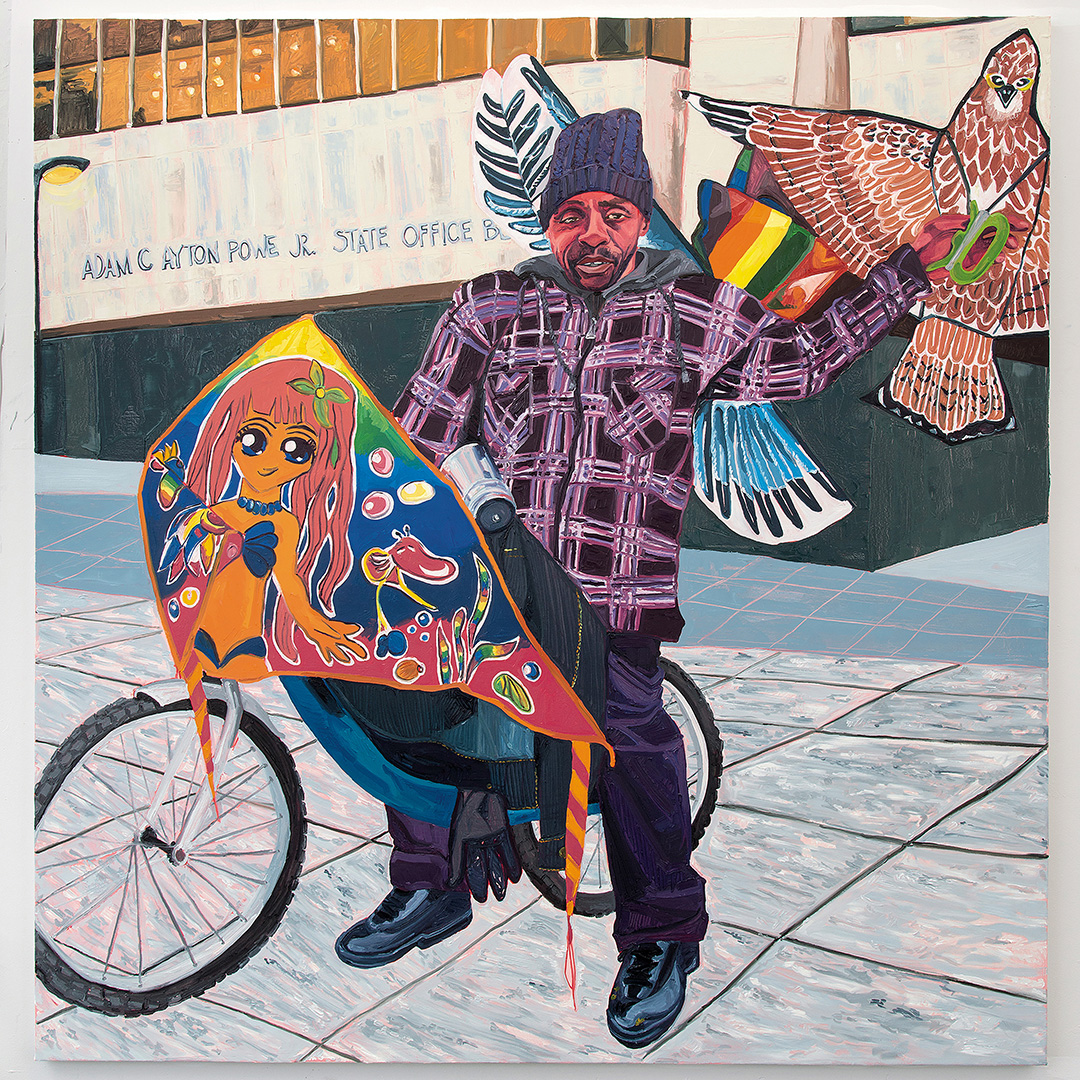 A painting of a man sitting on a bicycle is on a sidewalk I front of a city building. He is wearing a knit cap and a purple plaid shirt. He has several kites on his back. He is holding a kite in the shape of a hawk in his left hand and in his right hand he holds a triangular kite with the picture of an anime girl. 