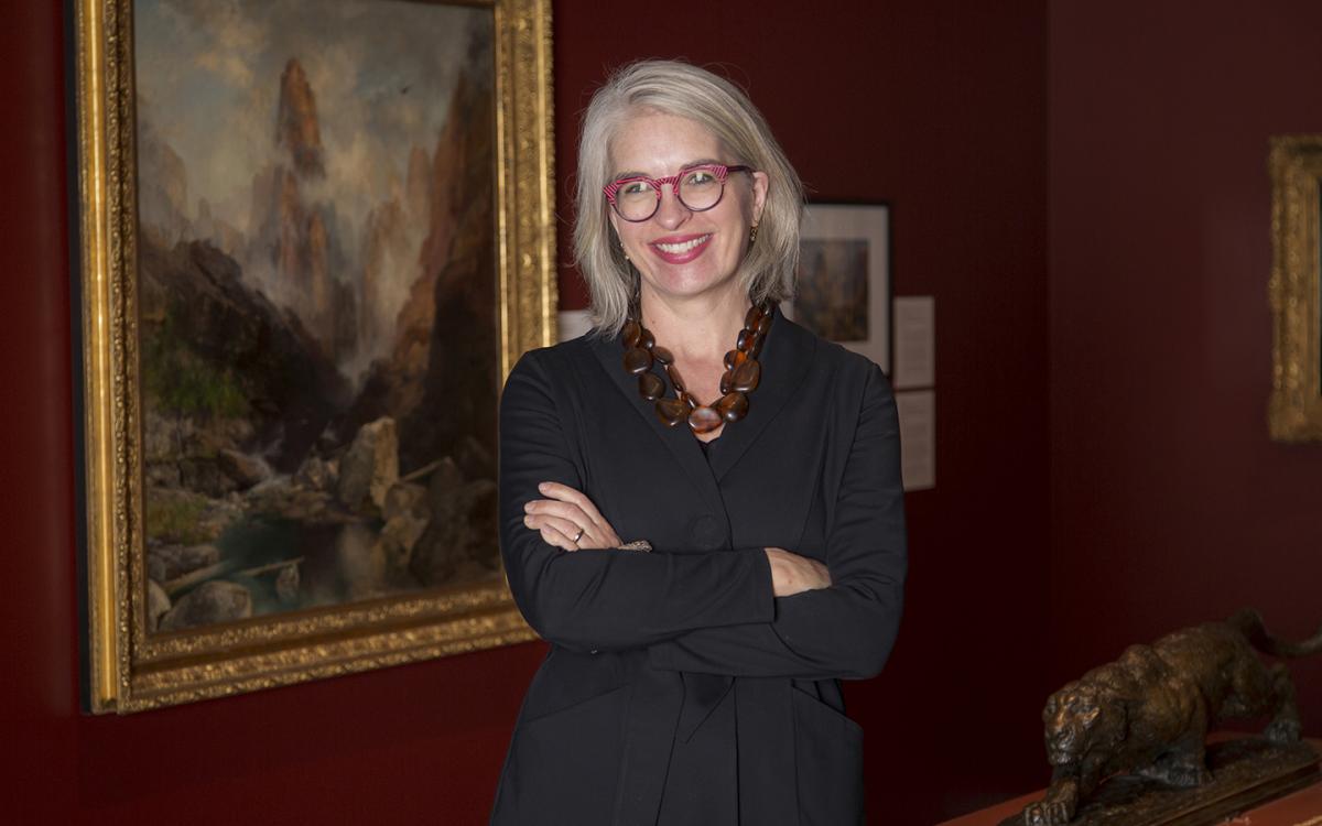 Gretchen Dietrich, Utah Museum of Fine Arts Executive Director stands in the American Gallery 