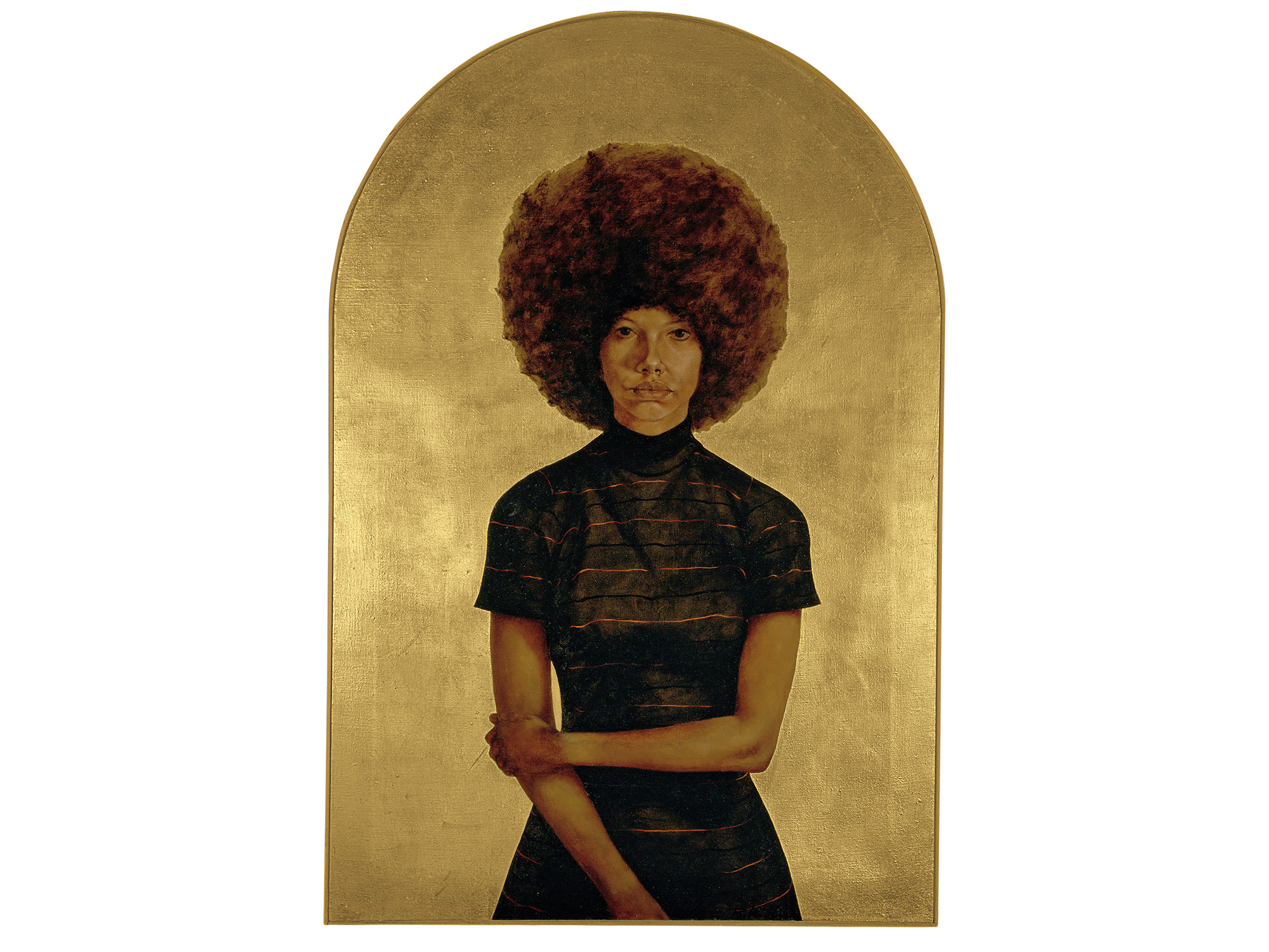 A painting of a woman in a short-sleeved black dress with orange stripes is facing forward looking at the viewer against a blank background covered in gold leaf. She is shown from the hips up and has one arm bent holding the opposite elbow. Her hair is a natural afro that frames her face in a circle. The top of the canvas forms an arch that mirrors the circle of her hair. 