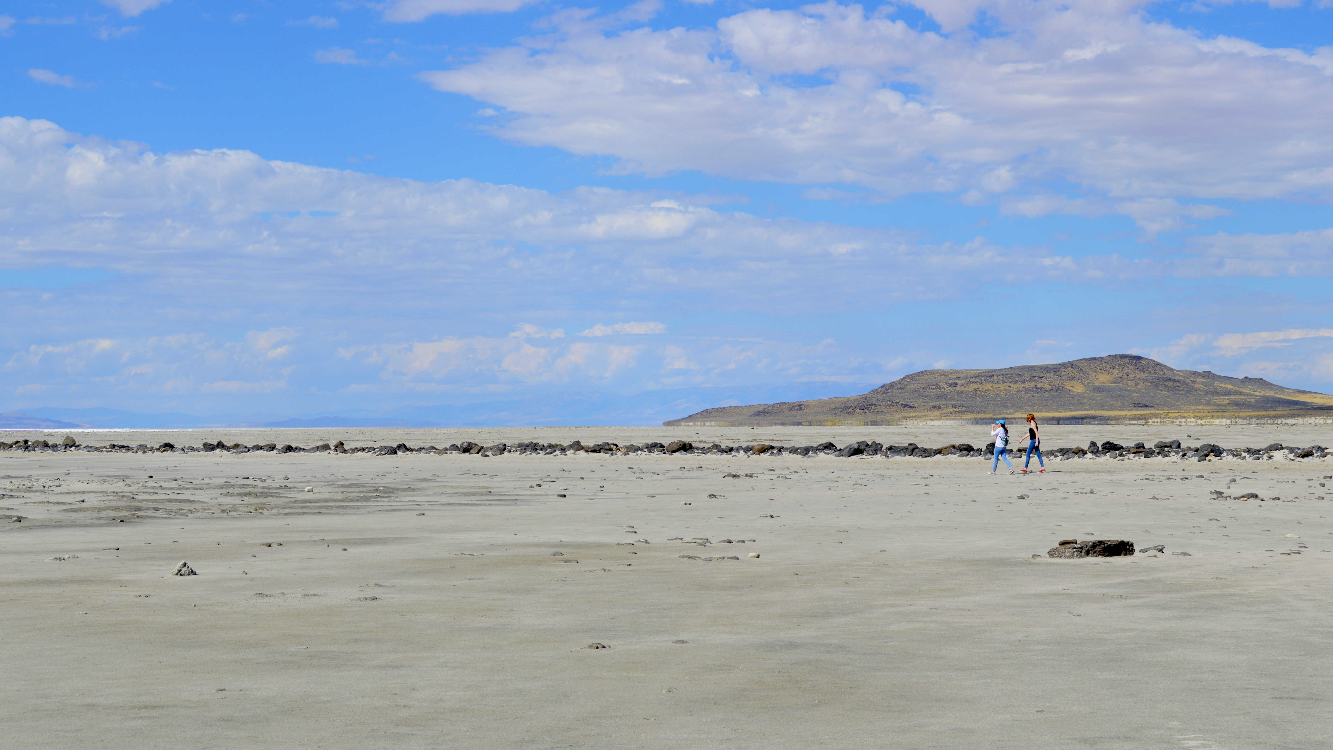People walking the Spiral Jetty