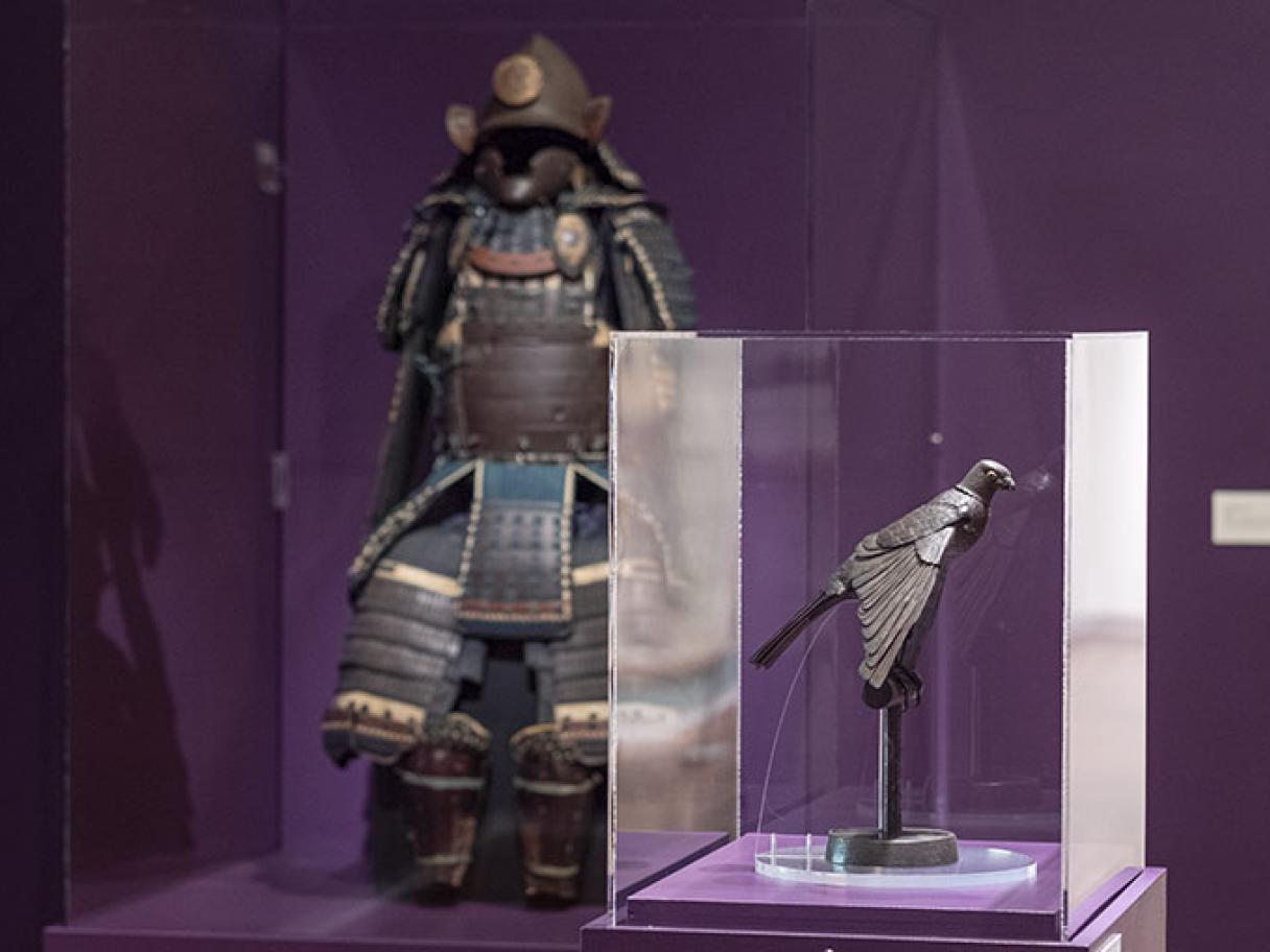 UMFA Art of Japan Gallery with metal raptor sculpture and samurai suit