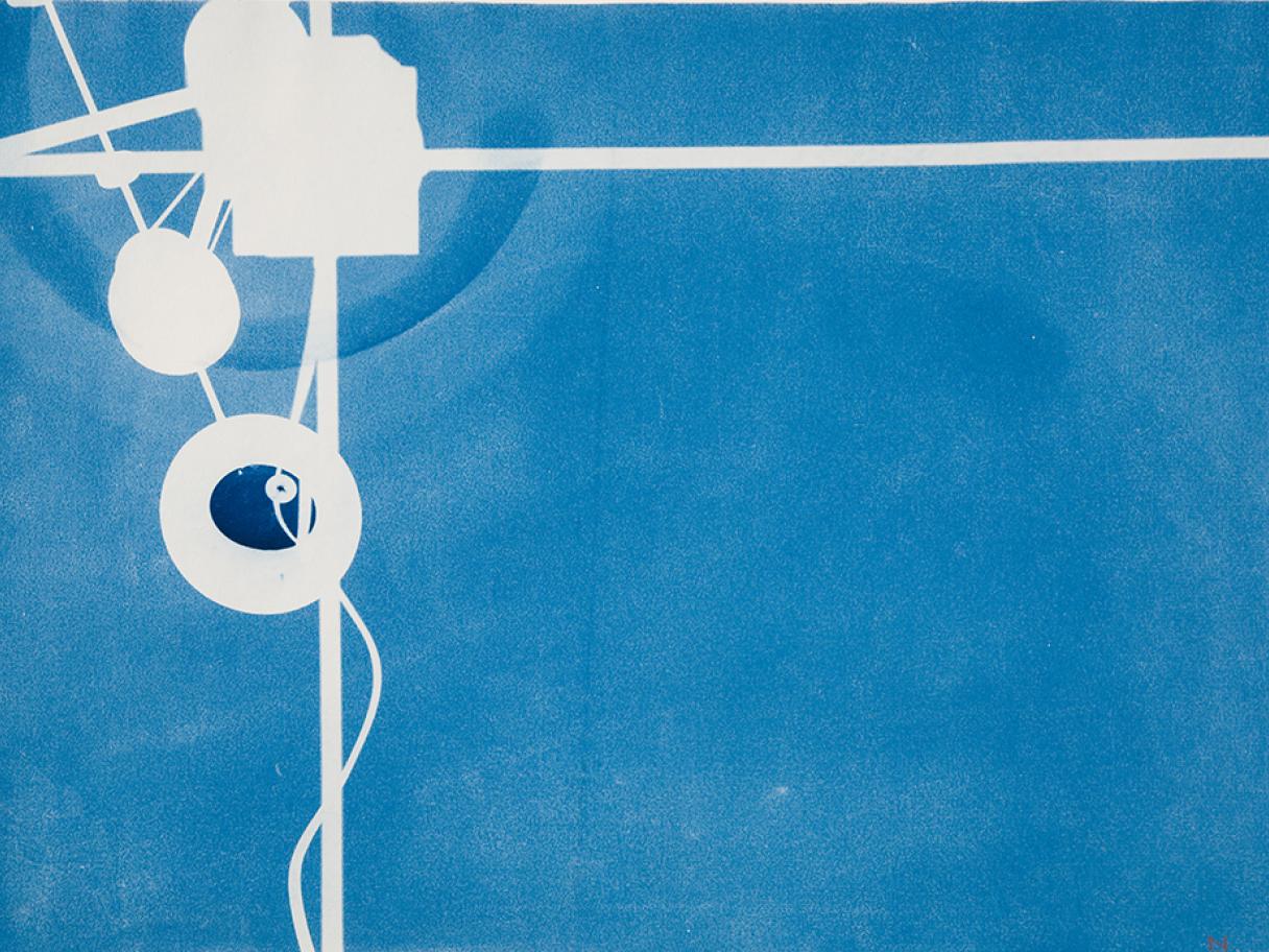 a cyanotype with strong whit lines running perpendicular to each other with two white circles and a rectangle grouped together at the intersection of the lines in the upper left corner 
