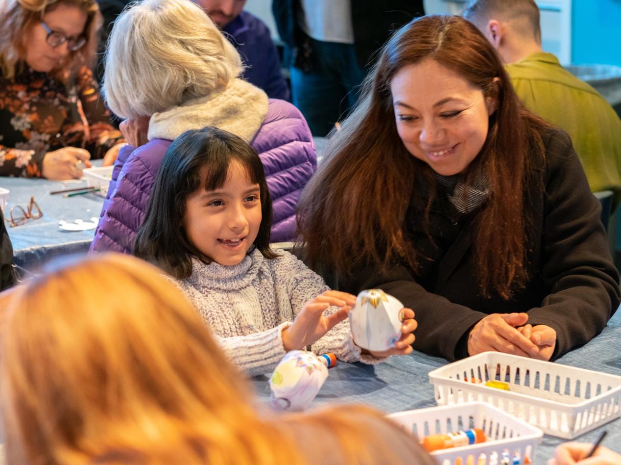 A mother and daughter in an art making activity