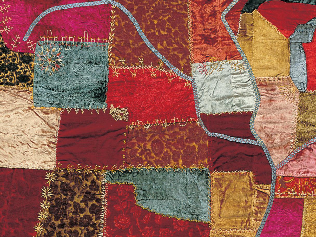 Handstitched Worlds Map Quilt hero image a quilted map of the United States