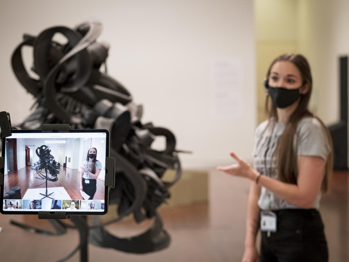 Katie Seastrand teaches a class though an iPad in the UMFA Modern and Contemporary gallery