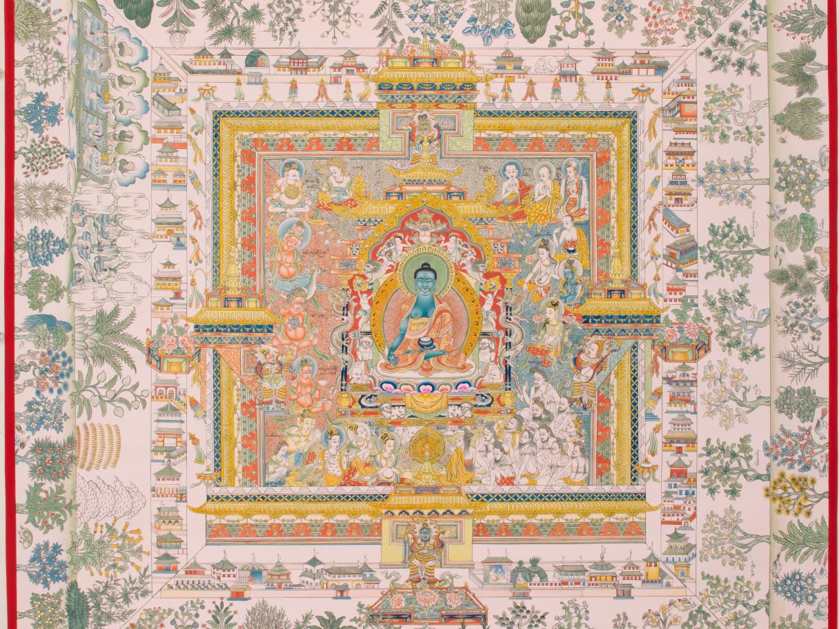 A mandala with a Buddha at the center.