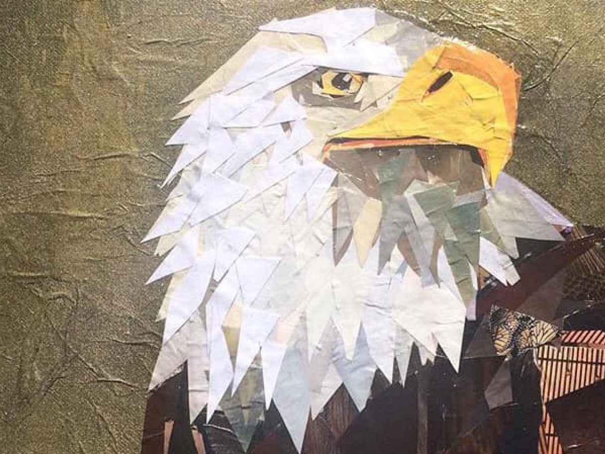 A paper collage of a bald eagle.
