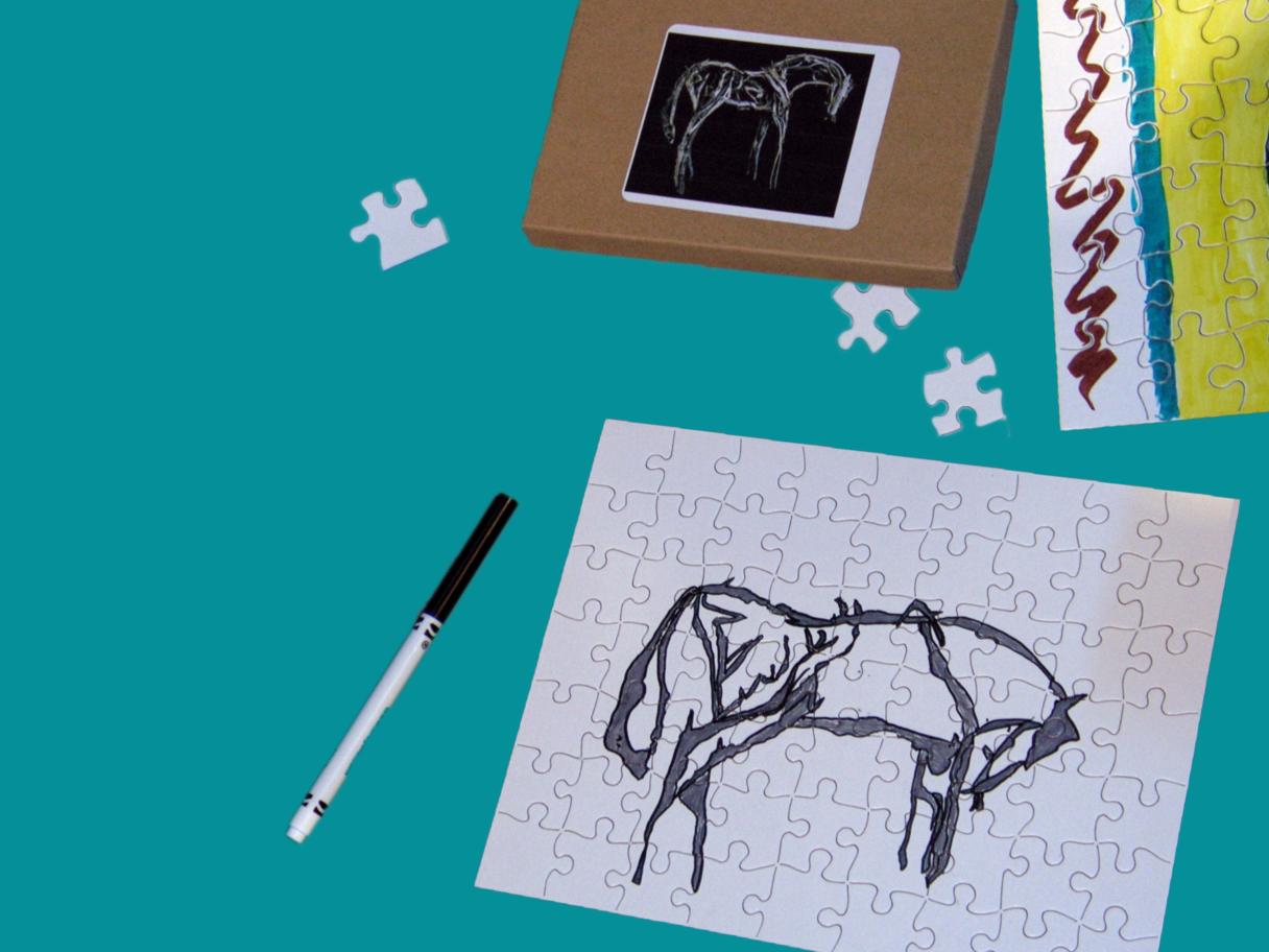 A puzzle with a drawing of a horse on it.