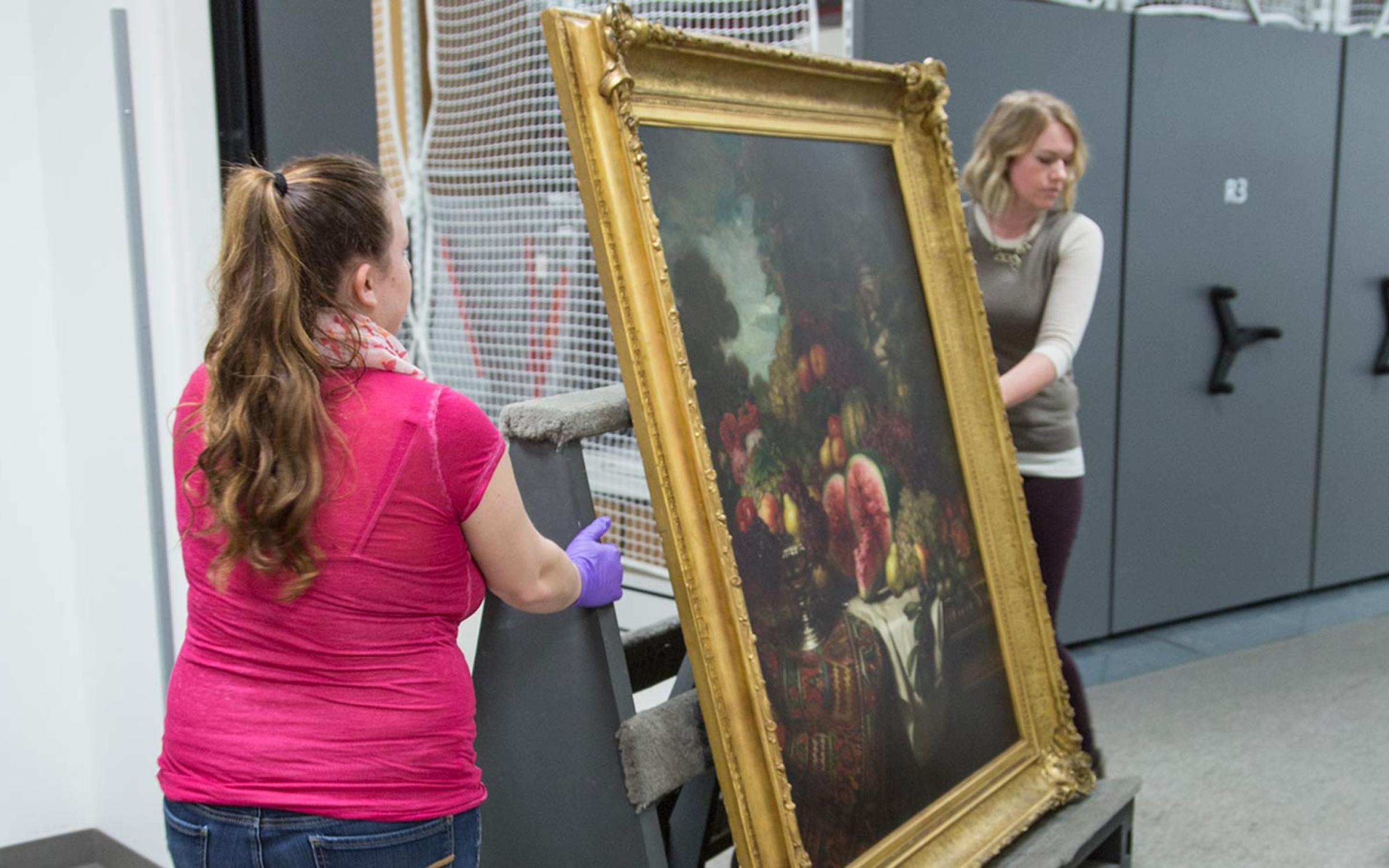 A student intern helping in the Collections department. 