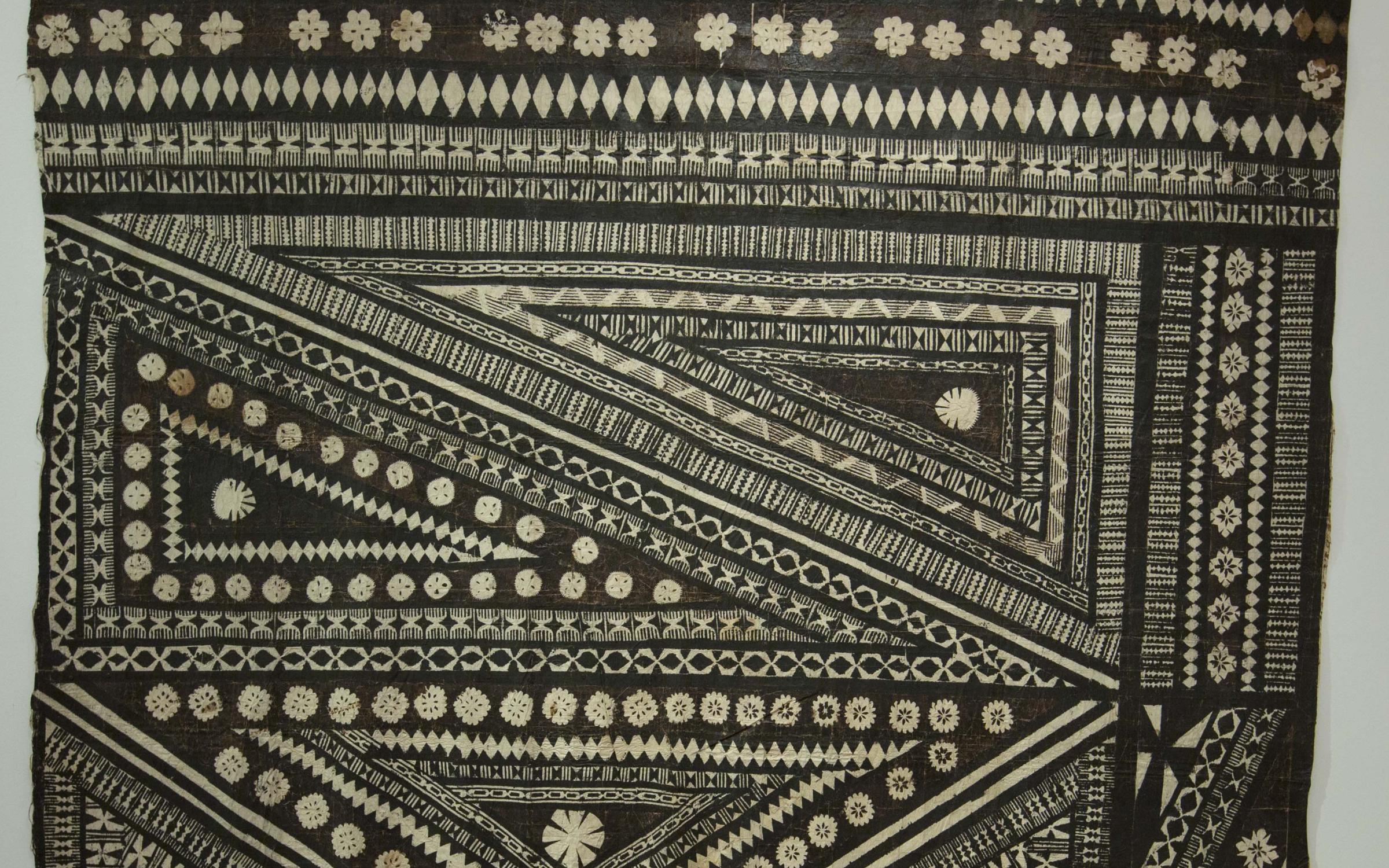 Unidentified artist (Fiji, late 19th or early 20th century) Barkcloth (Masi) fragment, barkcloth, pigment, and resin, 103 3/4 x 95 in, gift of the Peacock Revocable Trust, UMFA2005.1.31. Unidentified artist (Fiji, late 19th or early 20th century) Barkcloth (Masi) fragment, barkcloth, pigment, and resin, 103 3/4 x 95 in, gift of the Peacock Revocable Trust, UMFA2005.1.31.