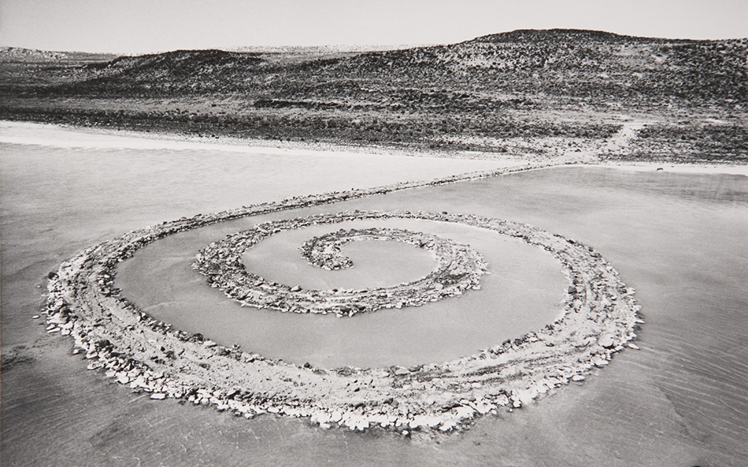 Robert Smithson (American, 1938–1973), Spiral Jetty, 1970, Rozel Point, Great Salt Lake, Utah, black basalt rock, salt crystals, earth, and water, 1,500 ft. long and approximately 15 ft. wide. © Holt/Smithson Foundation and Dia Art Foundation, licensed by VAGA, New York.