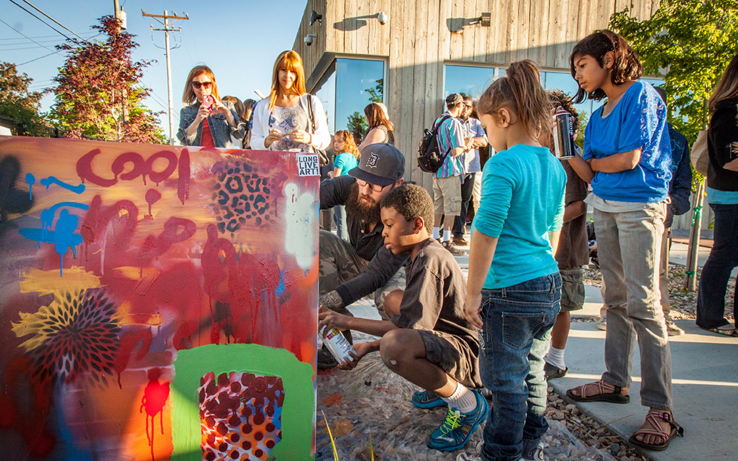 ACME Initiative A group of people making art together