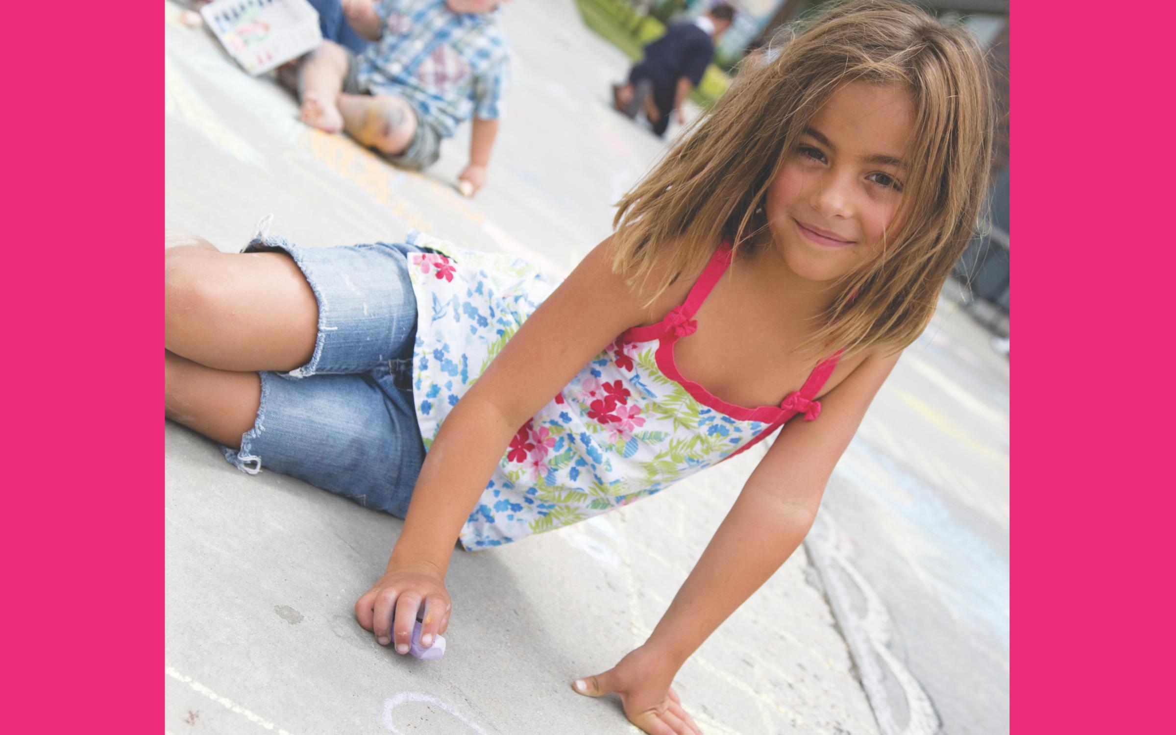 Join us for UMFA Mural Day A girl drawing with chalk