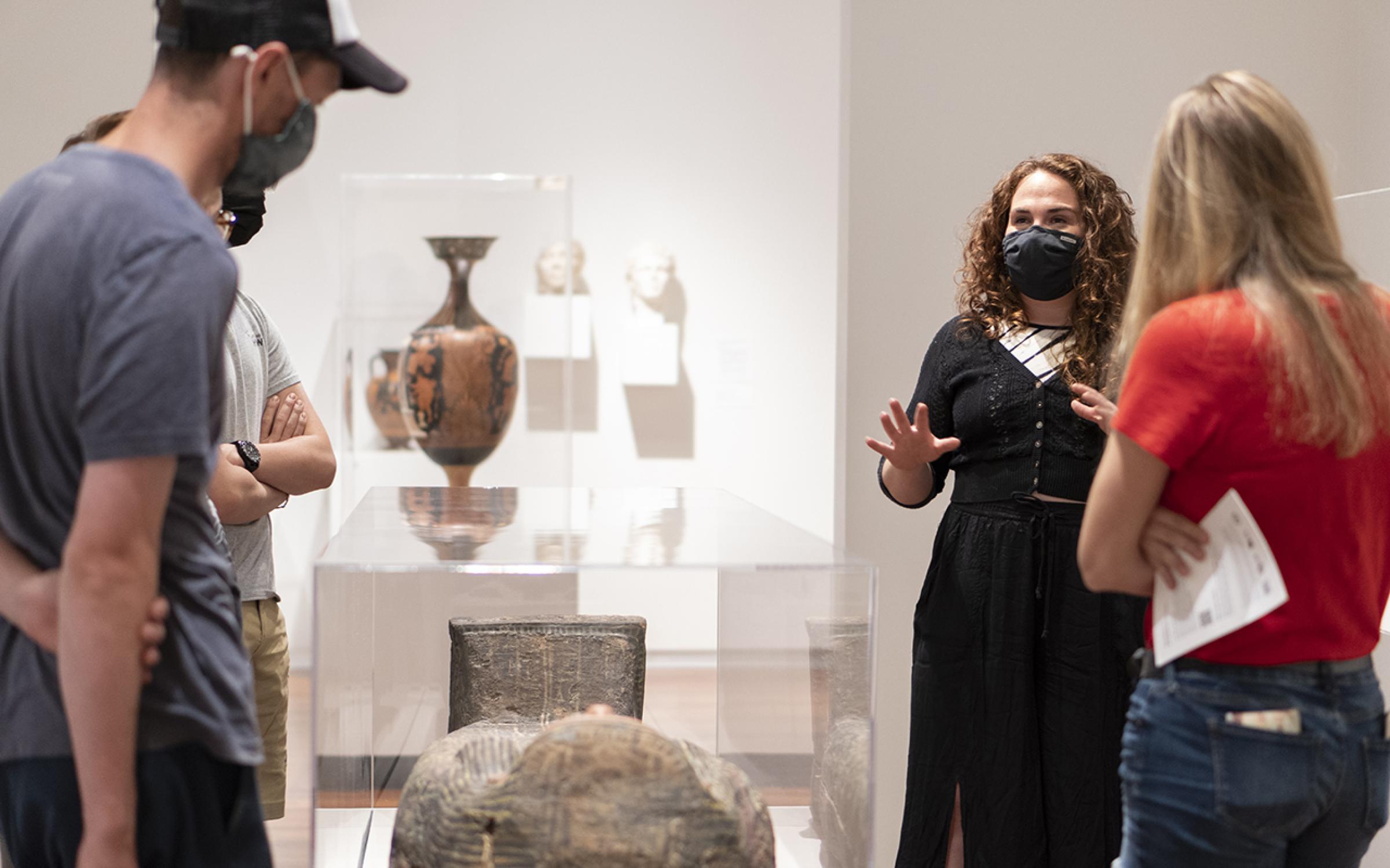 A woman giving a tour in the Egyptian gallery