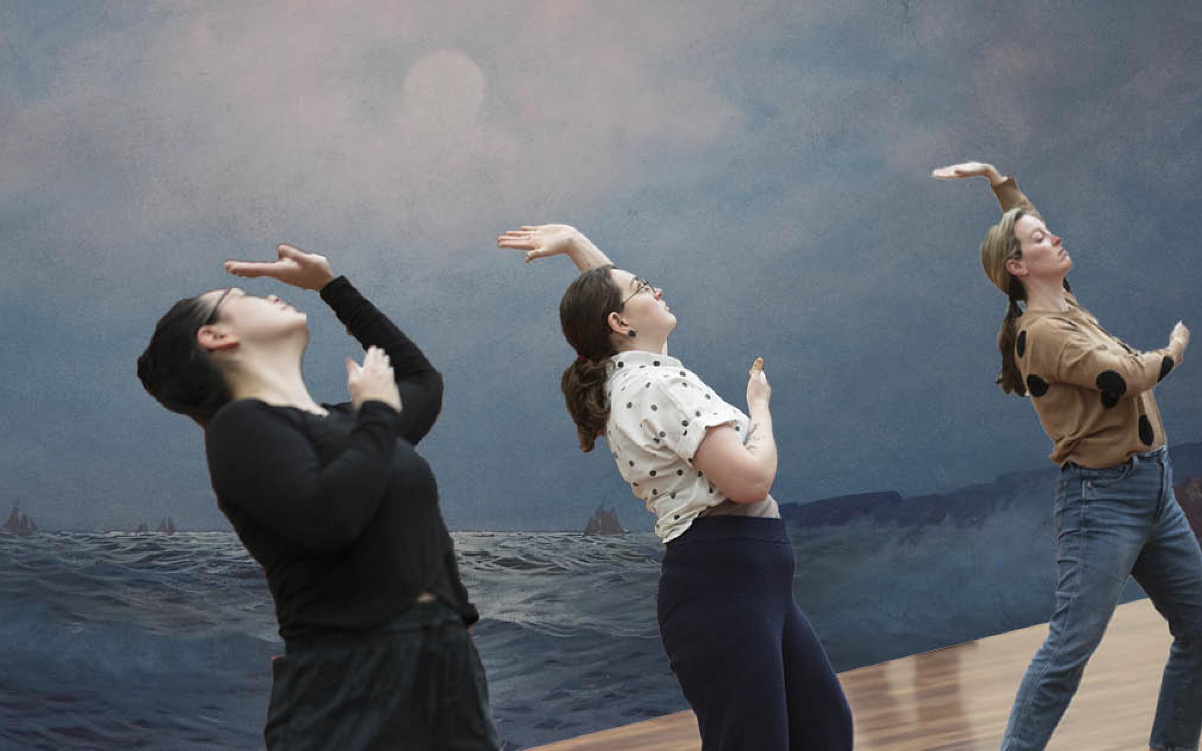 Four people practice tai chi in front of a blue painting of ocean and sky.